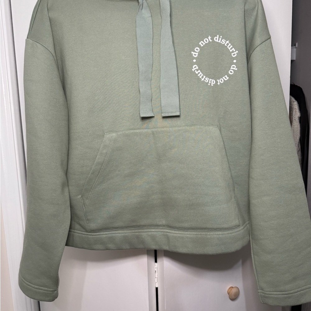 Lou & Grey Super Soft Sage Green Hoodie with 'Do Not Disturb' Stitching.
